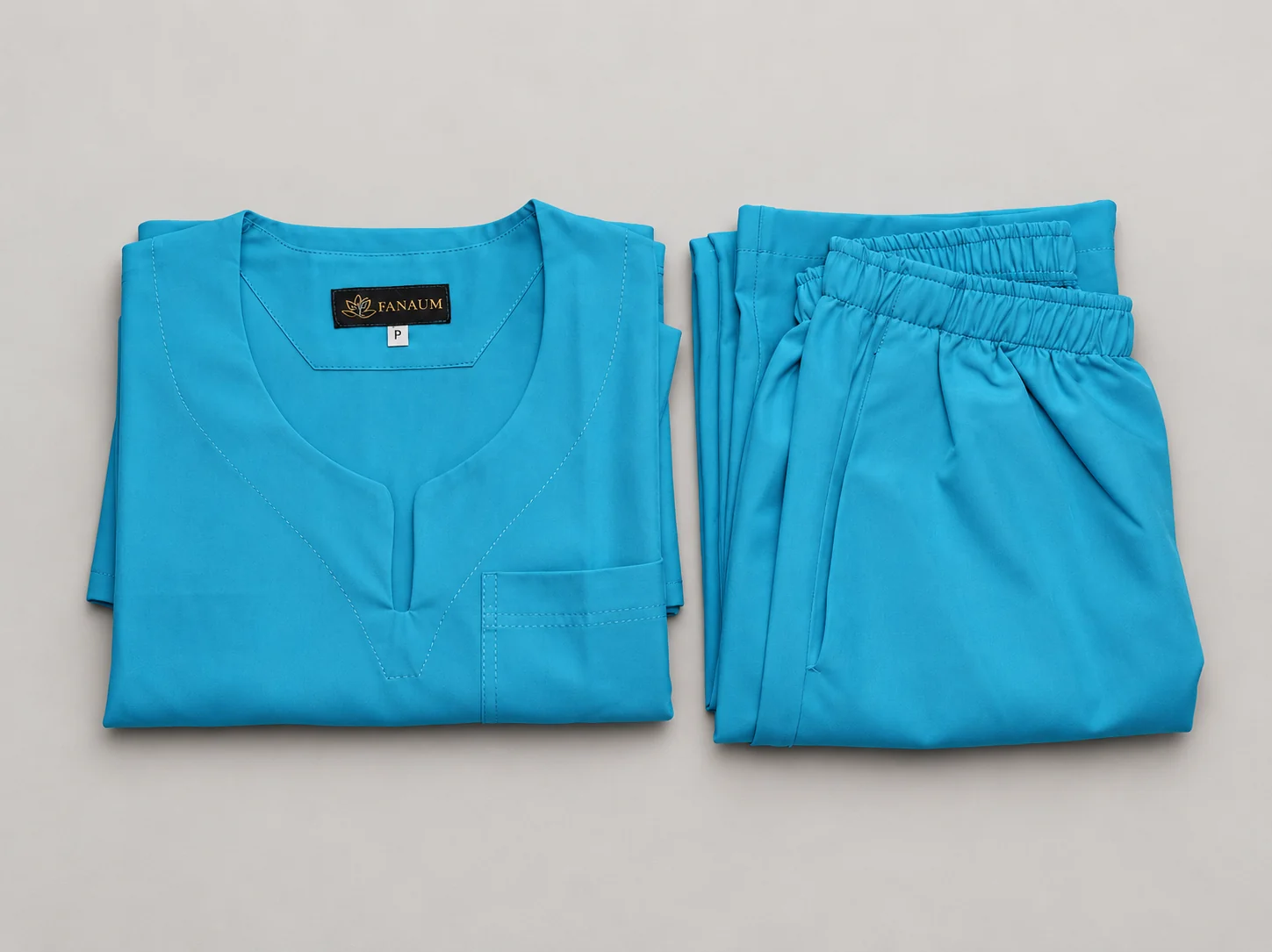 Conjunto médico celeste turquesa talle P doblado